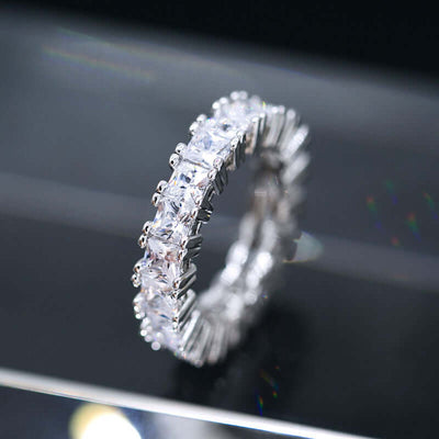 Luxury zircon ring featuring a stunning row of square and round zircon stones, ideal for elegant occasions.